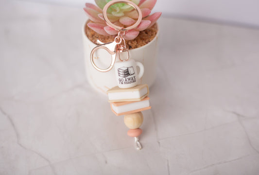 Go Away I’m Reading Keychain – Book Lover Accessory